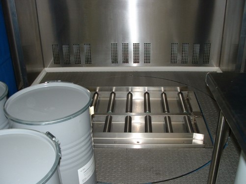 Automated sampling booth