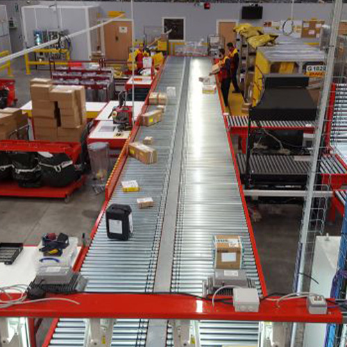 Ligne de tri avec convoyeur de déchargement sur rail